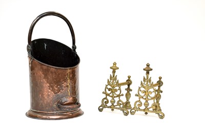 Lot 169 - A pair of brass fire dogs and a copper coal bucket