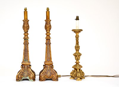 Lot 168 - A pair of reproduction giltwood table lamps and another similar