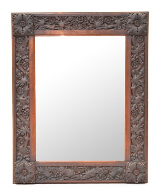 Lot 196 - A carved oak overmantel mirror