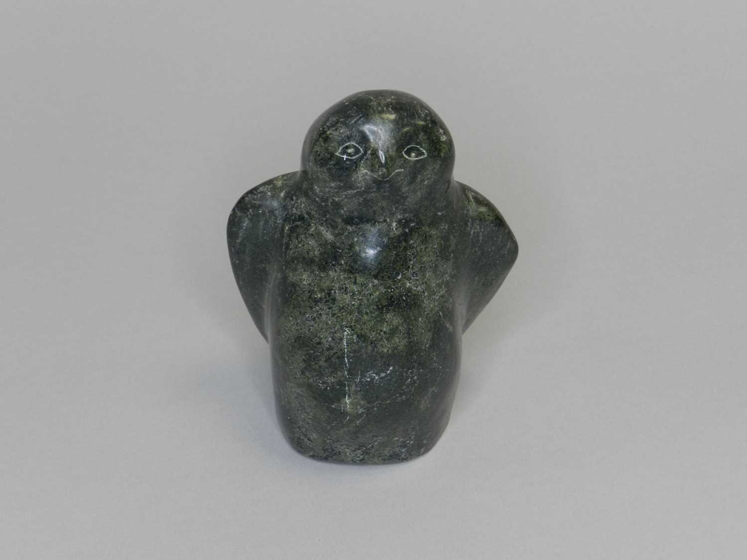 Lot 272 - A North American Inuit greenstone carved owl