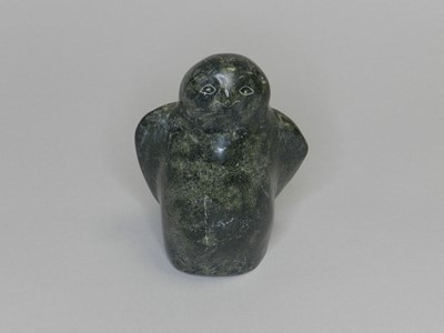 Lot 272 - A North American Inuit greenstone carved owl