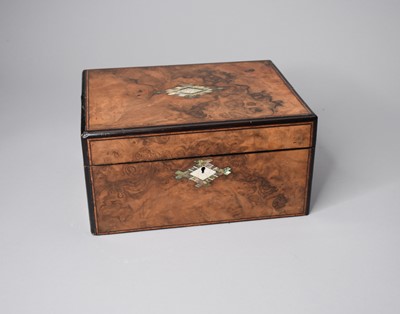 Lot 530 - A Victorian figured walnut work box