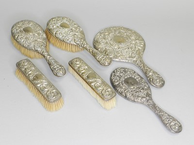 Lot 156 - An Edwardian silver mounted dressing table set