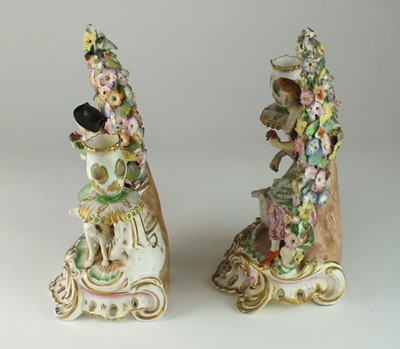Lot 165 - A pair of John Bevington bocage candlestick figures
