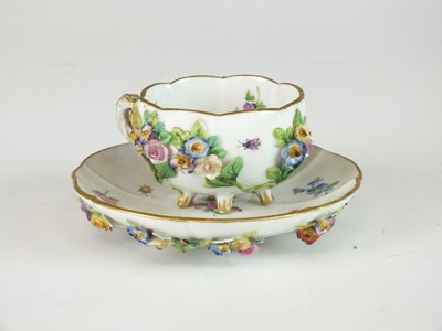 Lot 266 - A Meissen relief-moulded cabinet cup and saucer