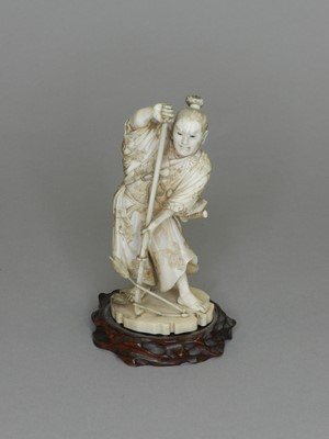 Lot 251 - A Japanese ivory okimono of a soldier