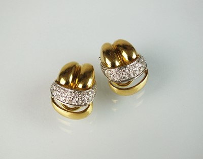 Lot 115 - A pair of diamond set clip on earrings