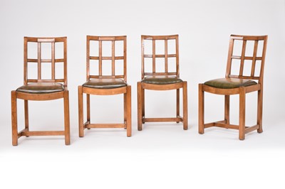 Lot 444 - A set of four oak Arts and Crafts style trellis-back standard chairs