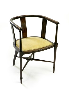 Lot 354 - An Edwardian mahogany open armchair and an occasional table