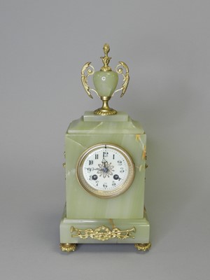 Lot 345 - A French onyx mantel clock
