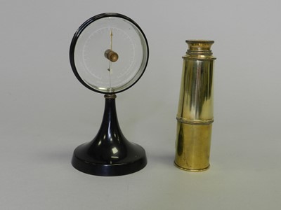 Lot 158 - A Goerz-Werk 'mystery' barometer and a brass pocket telescope