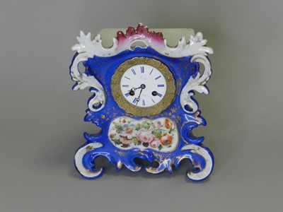 Lot 160 - A French Rococo style porcelain mantel clock, by 'Leroy Paris'  and another (2)