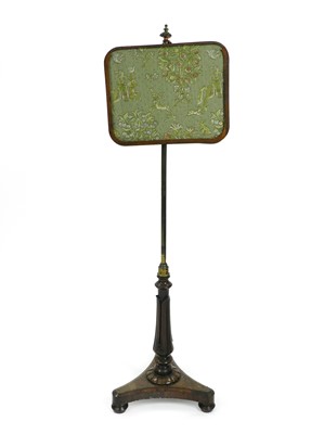 Lot 403 - A William IV rosewood polescreen, with a brass...