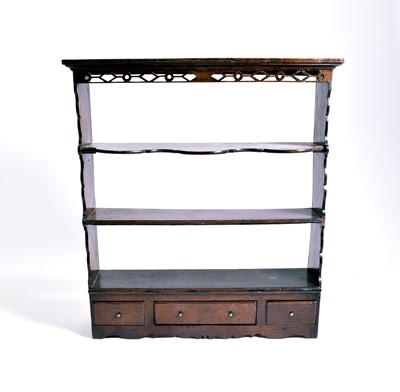 Lot 232 - An 18th century style oak hanging shelves with...