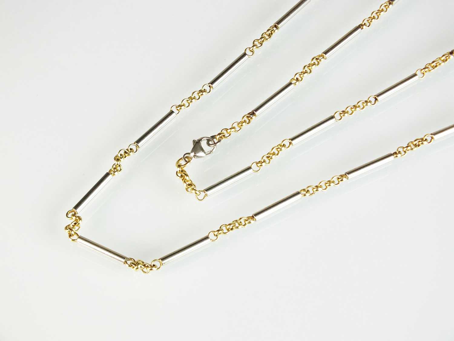 Lot 61 - A platinum and yellow metal chain necklace
