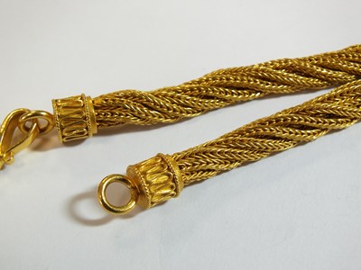 Lot 95 - A yellow metal multi-strand rope twist chain necklace