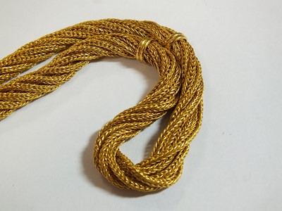Lot 95 - A yellow metal multi-strand rope twist chain necklace