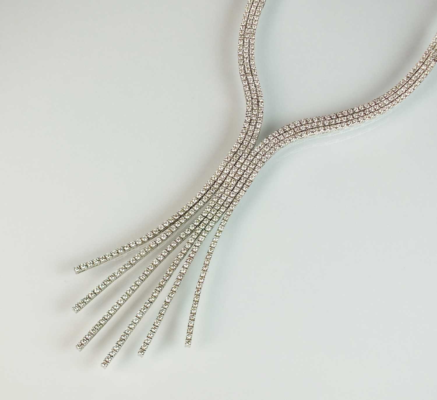 Lot 55 - A diamond set stylised tassel fringe necklace