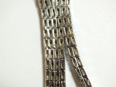 Lot 55 - A diamond set stylised tassel fringe necklace