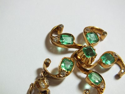 Lot 56 - An emerald and diamond stylised star pendant