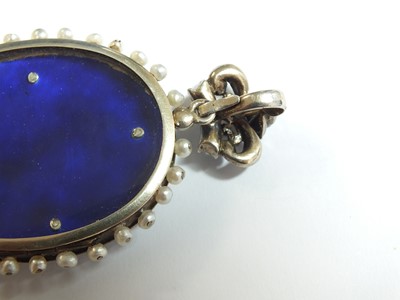 Lot 137 - A 19th century enamel and seed pearl portrait pendant