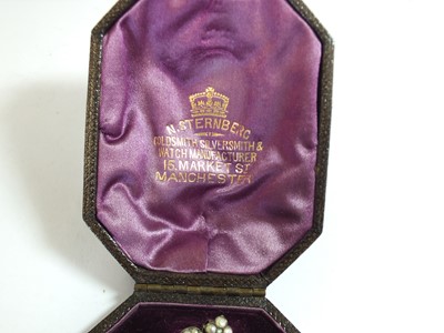Lot 137 - A 19th century enamel and seed pearl portrait pendant
