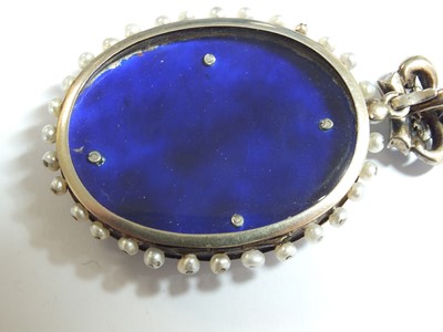 Lot 137 - A 19th century enamel and seed pearl portrait pendant