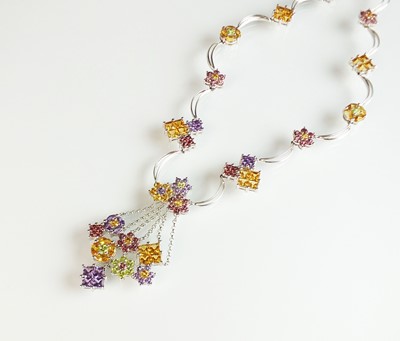 Lot 59 - A multi-gem set floral necklace
