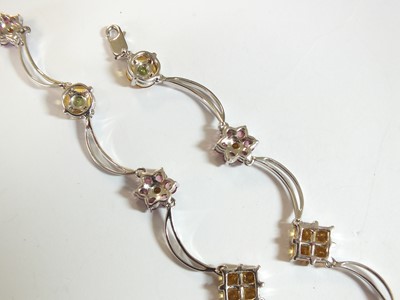Lot 59 - A multi-gem set floral necklace