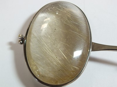 Lot 42 - A Georg Jensen silver neck ring and rutilated quartz pendant designed by Vivianna Torun Bulow-Hube