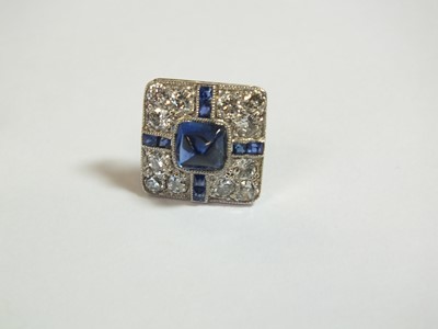 Lot 58 - An Art Deco diamond and sapphire brooch with associated earrings