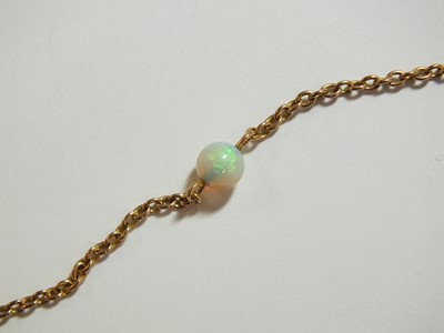 Lot 103 - An opal bead guard chain