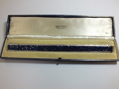 Lot 141 - An Art Deco style sapphire and diamond line bracelet