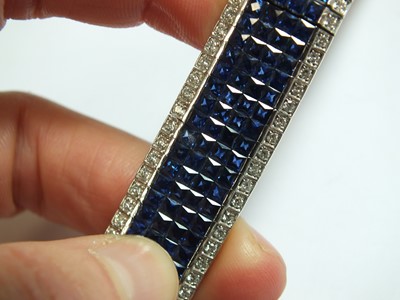 Lot 141 - An Art Deco style sapphire and diamond line bracelet