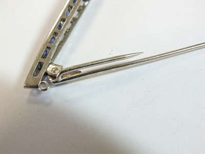 Lot 68 - A Victorian style graduated sapphire and diamond line brooch