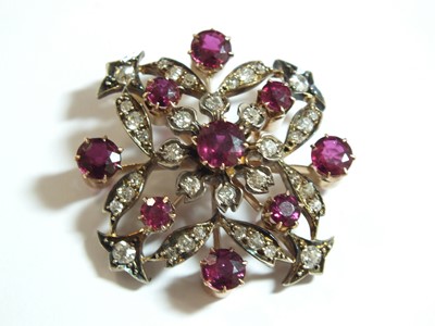 Lot 54 - A late 19th century diamond and ruby brooch/pendant