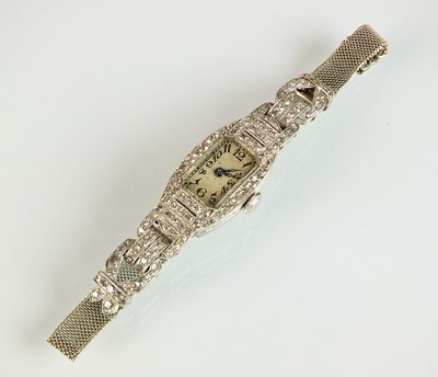 Lot 143 - An Art Deco platinum and diamond cocktail wristwatch