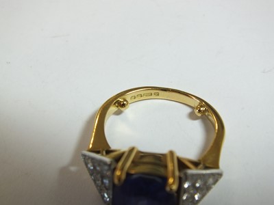 Lot 93 - An 18ct gold tanzanite and diamond dress ring,...