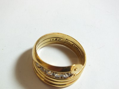 Lot 92 - An 18ct gold diamond set snake ring