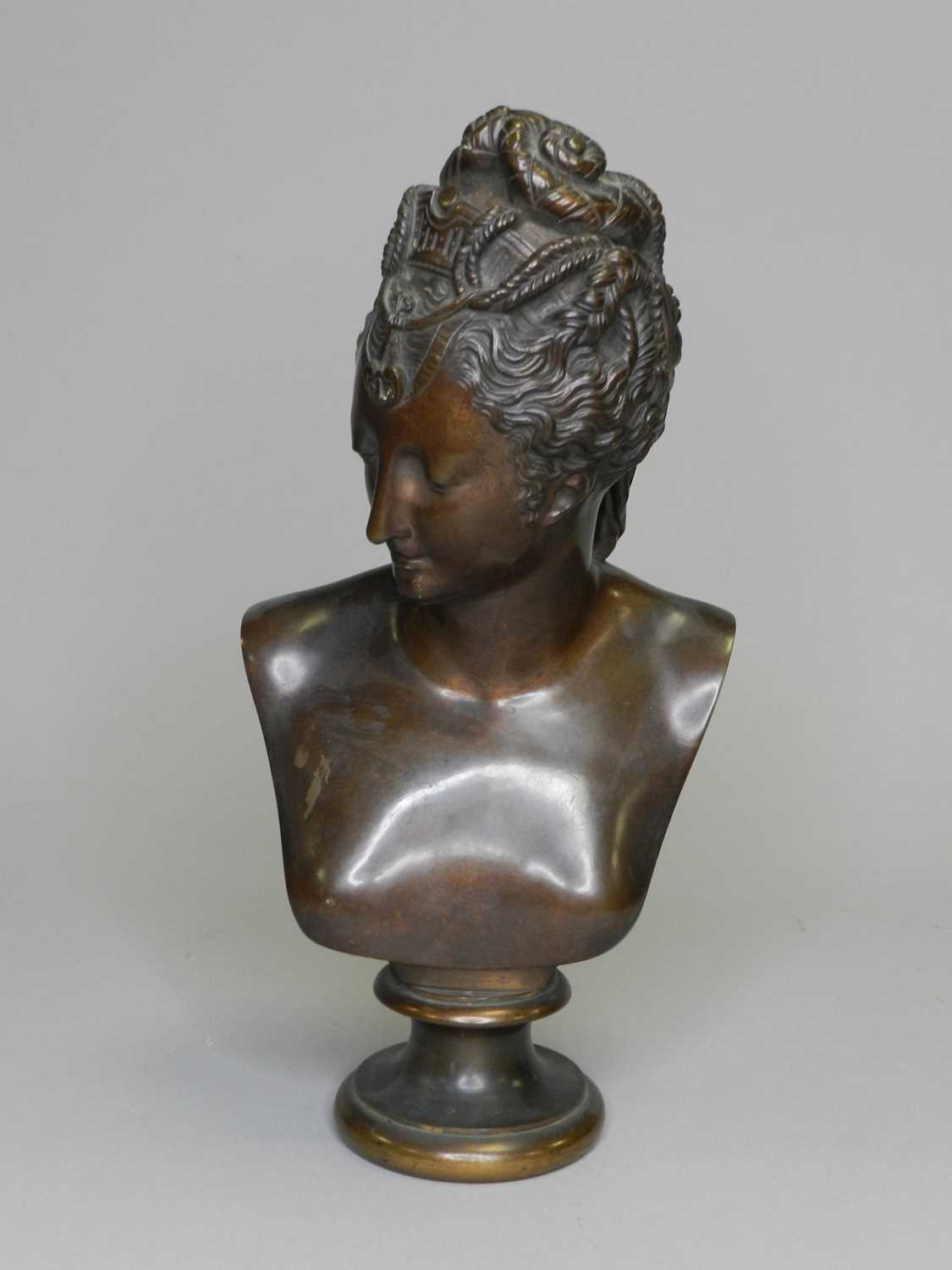 Lot 267 - A late 19th century bronze bust of a woman...