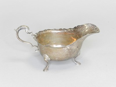 Lot 141 - A silver sauce boat