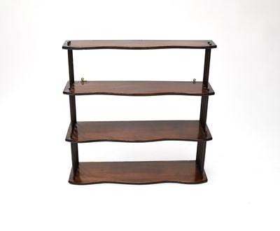 Lot 233 - A set of serpentine-fronted wall shelves, 4 tiers