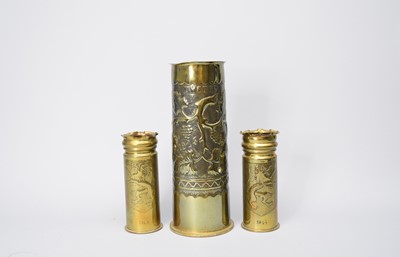Lot 477 - Trench Art:- A WWI brass artillery shell, dated 1914-1918, a similarly dated pair and a matchbox (4)