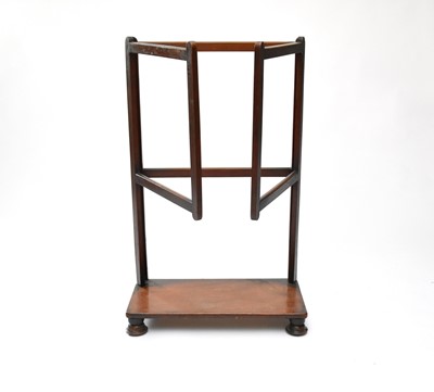 Lot 208 - An unusual mahogany towel rail with a platform base