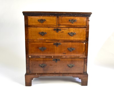 Lot 209 - A George II walnut veneered chest of drawers