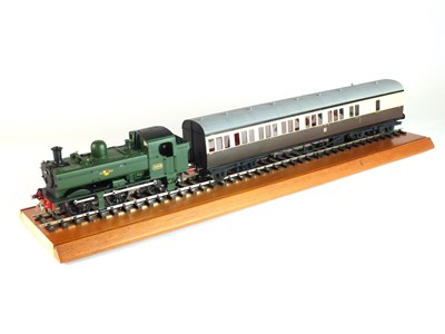 Lot 133 - A plastic O-gauge model of a steam locomotive, '3668', with a pair of carriages