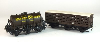 Lot 135 - A good O-gauge model of a goods wagon, 'Glass Lined United Dairies Milk Tank', plus one (2)