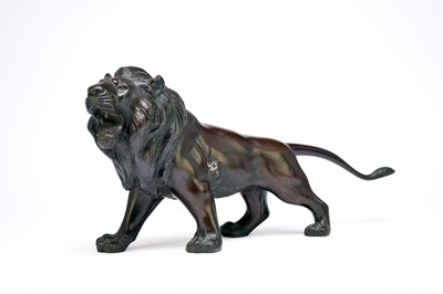 Lot 389 - A Japanese bronze figure of a lion, Meiji period