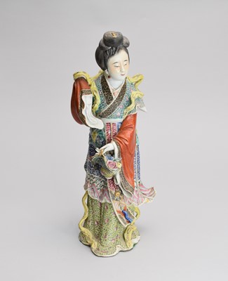 Lot 468 - A Chinese famille rose figure of a maiden or Guanyin