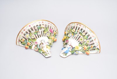 Lot 435 - A pair of German porcelain figural basket-form wall brackets